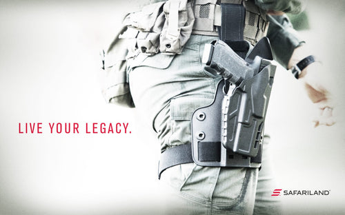 Person wearing a gun holster with 'Live Your Legacy' text and Safariland logo.